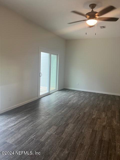 10322 State Rte 100 Starke, FL 32091 - Photo 3 of 15 wooden floor in an empty room