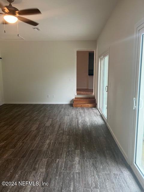 10322 State Rte 100 Starke, FL 32091 - Photo 6 of 15 a view of an empty room with wooden floor