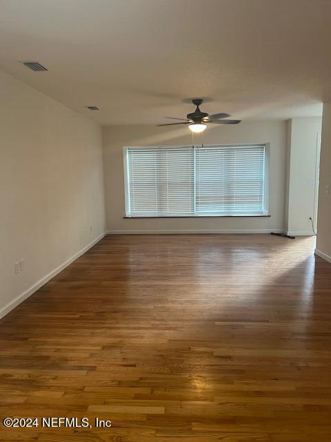 10322 State Rte 100 Starke, FL 32091 - Photo 7 of 15 a view of empty room with wooden floor
