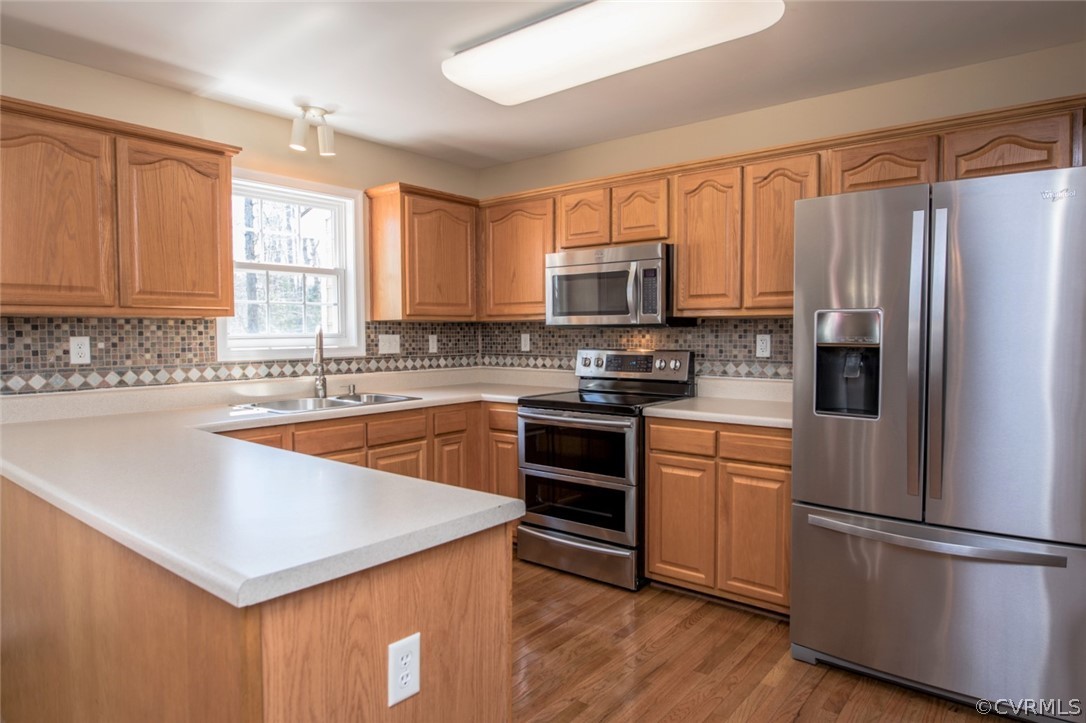 13513 Brandy Oaks Road Chesterfield, VA 23832 - Photo 4 of 38 Kitchen featuring NEW HARDWOOD floor, stainless st
