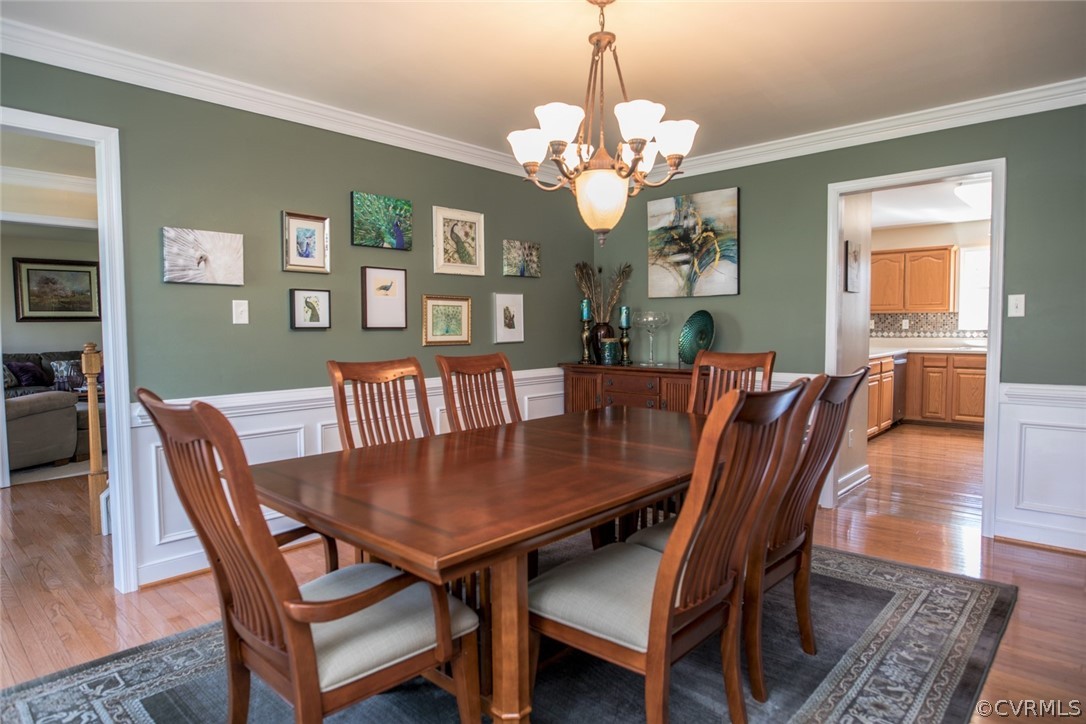 13513 Brandy Oaks Road Chesterfield, VA 23832 - Photo 8 of 38 Formal dining room features original hardwood floo