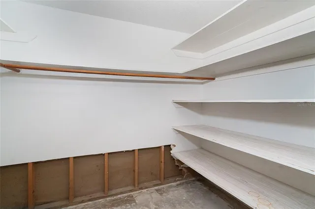 a view of room with rack on the wall