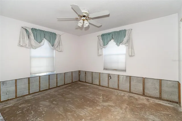 en empty room with windows