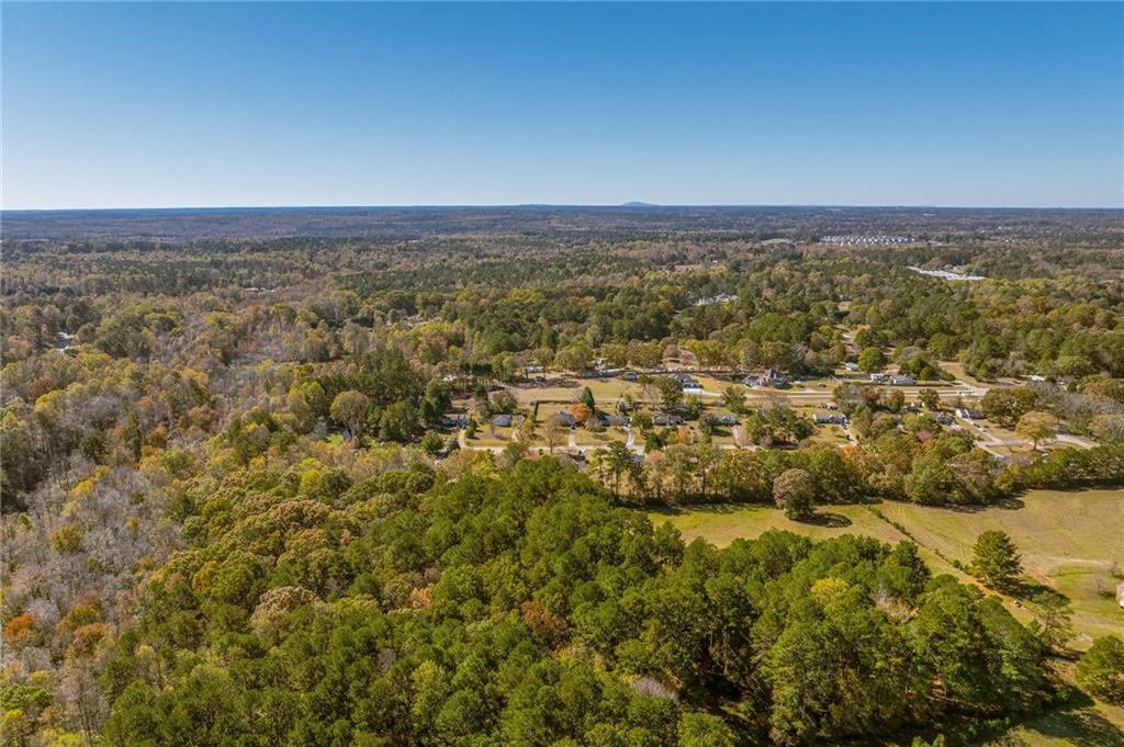 335 Wages Road Auburn, GA 30011 - Photo 11 of 35 an aerial view of residential building and green space