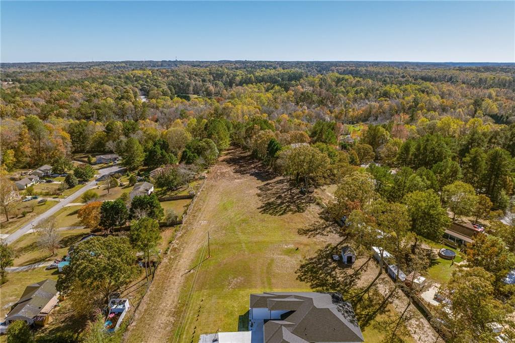 335 Wages Road Auburn, GA 30011 - Photo 13 of 35 a view of an outdoor space and a lake view