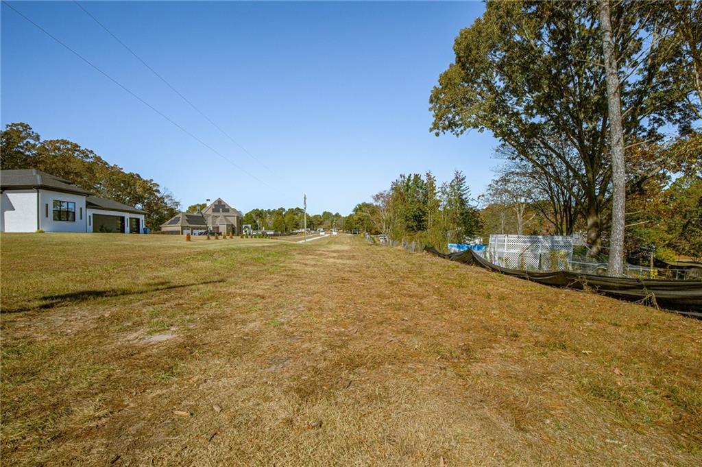 335 Wages Road Auburn, GA 30011 - Photo 3 of 35 a view of ocean with trees