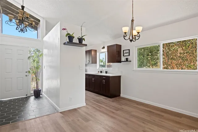 a spacious bathroom with a double vanity sink and a mirror