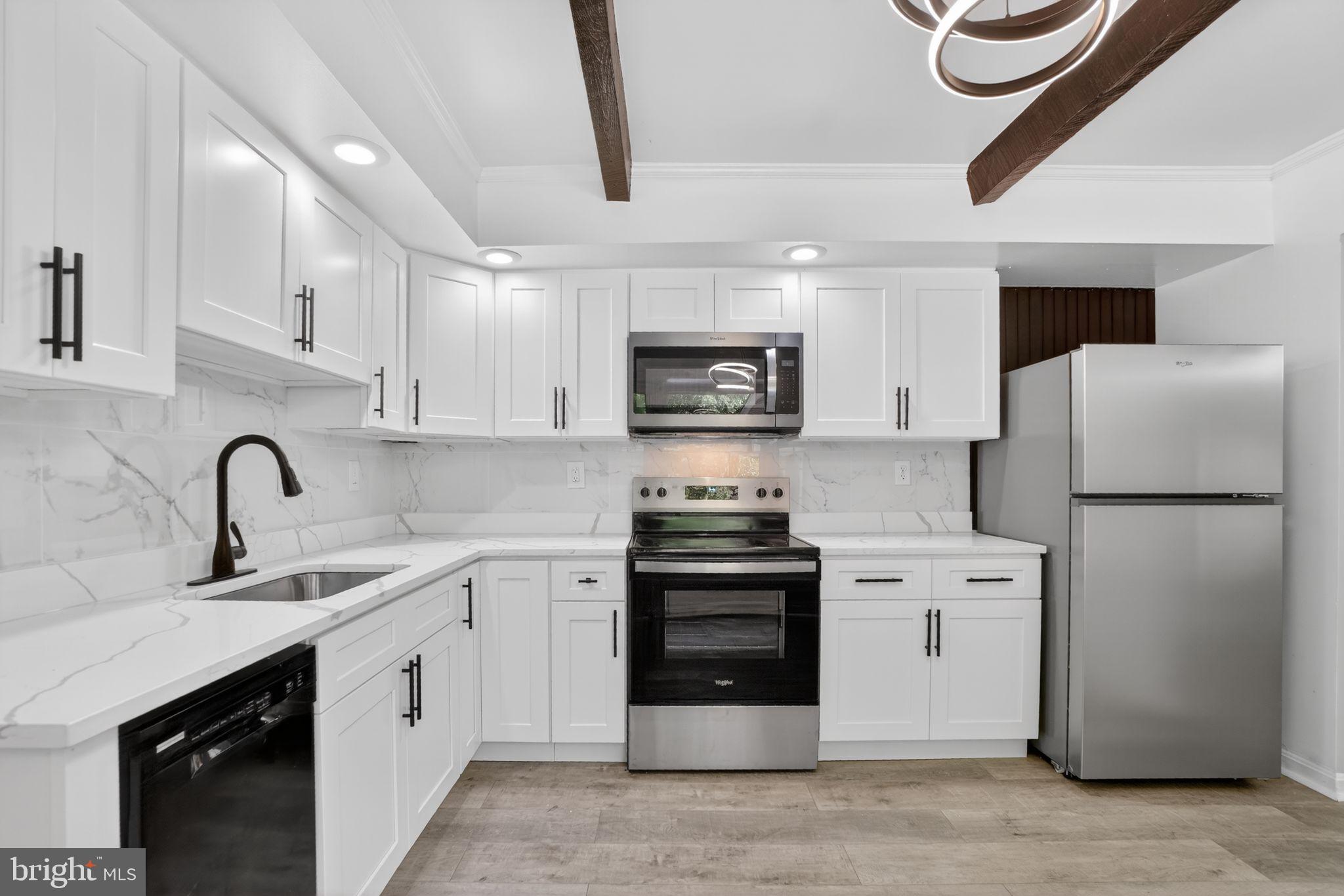 507 Clarks Run Road La Plata, MD 20646 - Photo 5 of 49 Modern kitchen with sleek finishes.