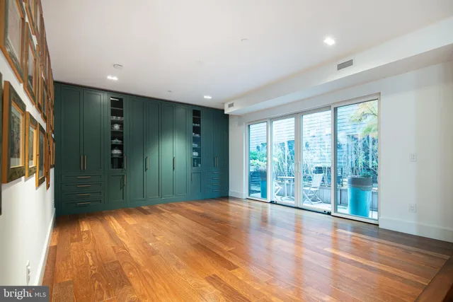 a view of entryway with wooden floor