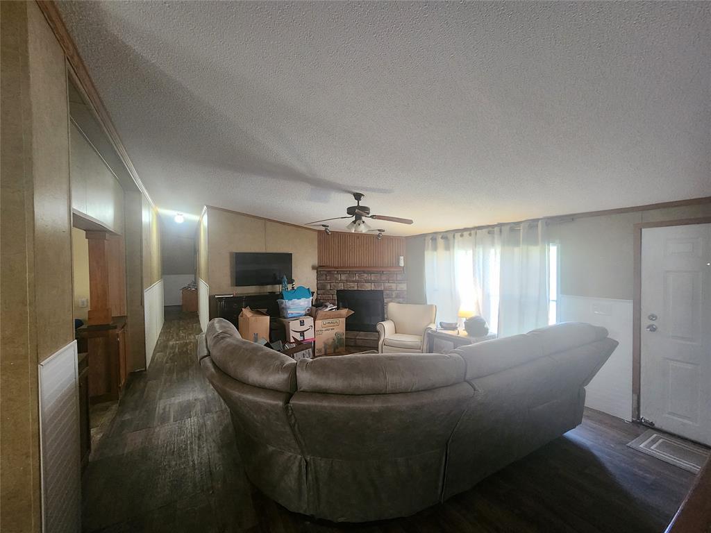 11308 County Road 313 East Tyler, TX 75708 - Photo 3 of 14 a living room with furniture and a flat screen tv