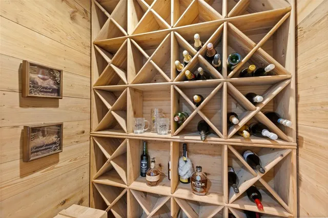 a balcony with furniture and wooden floor