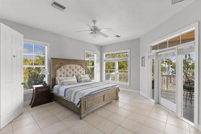 a view of backyard with swimming pool and outdoor seating