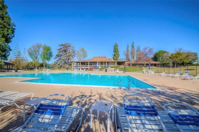 an aerial view of a house with a lake view