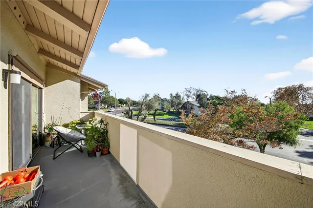 a view of roof deck with furniture