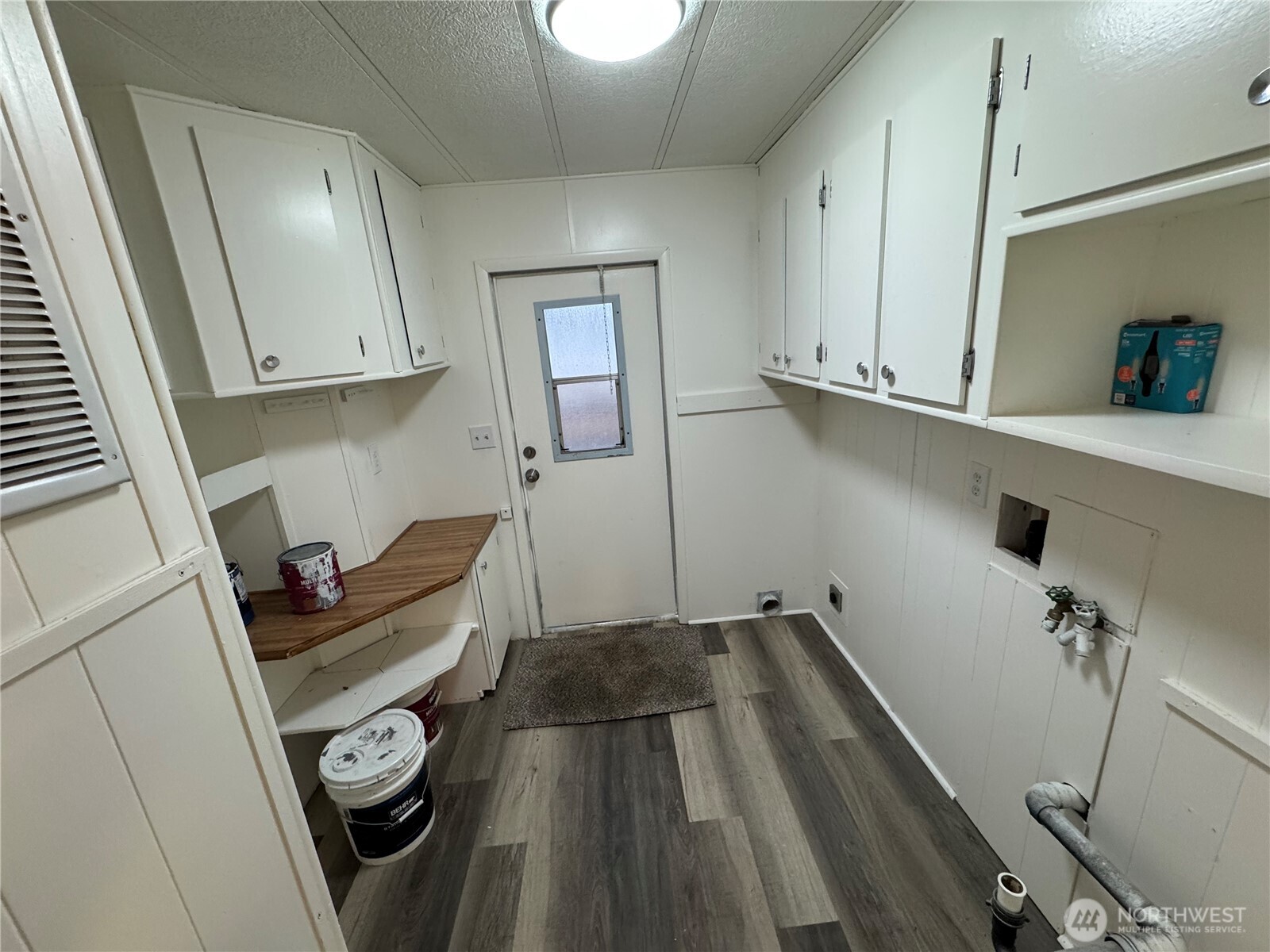 5705 Littlerock Road Southwest, Unit 10 Tumwater, WA 98512 - Photo 4 of 7 a kitchen with a sink and cabinets