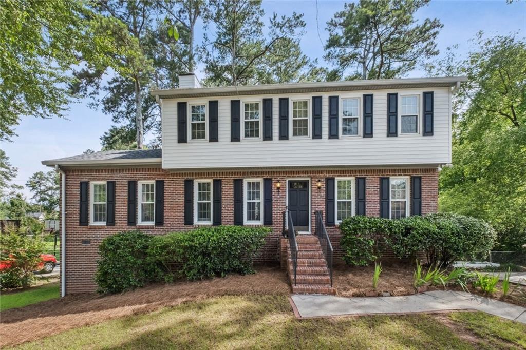 a front view of a house with porch