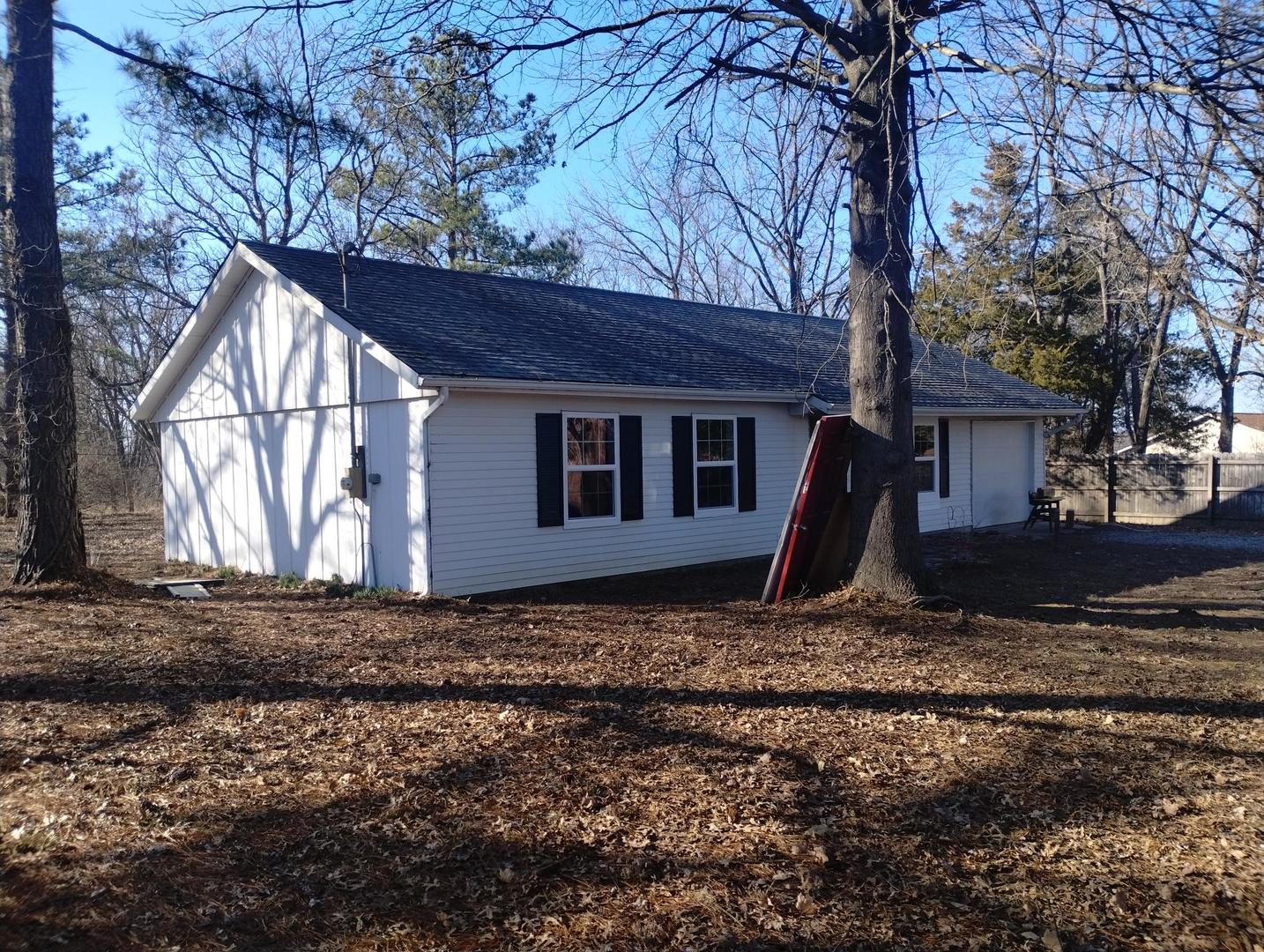 12527 Greenbriar Road Carterville, IL 62918 - Photo 2 of 12 a view of a house with backyard