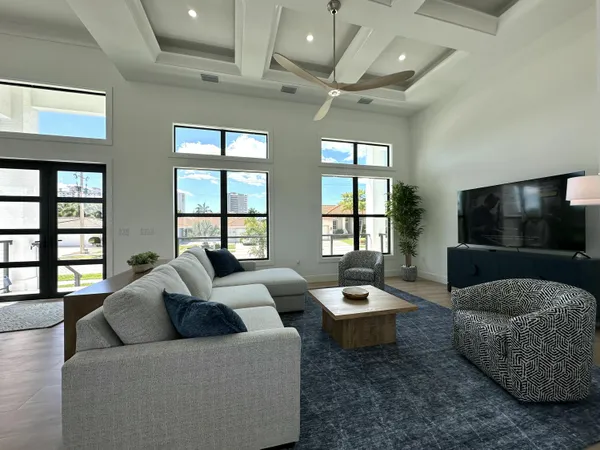 a bedroom with a large bed and a large window