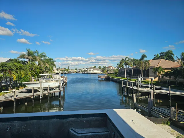 a view of a lake from a balcony