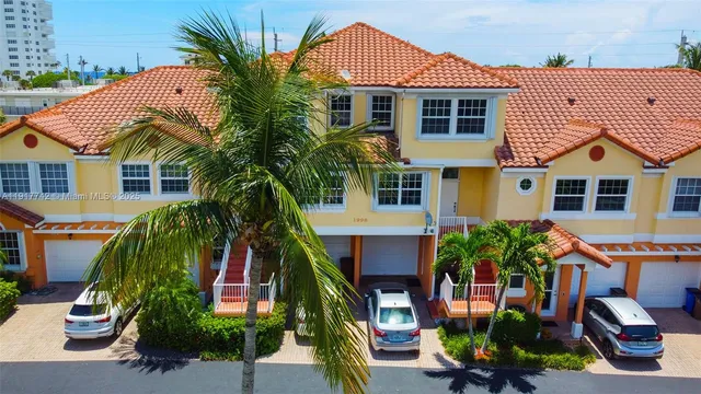 a kitchen with wooden cabinets and a stove top oven