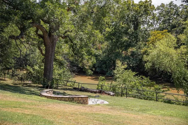 a view of a backyard of a house