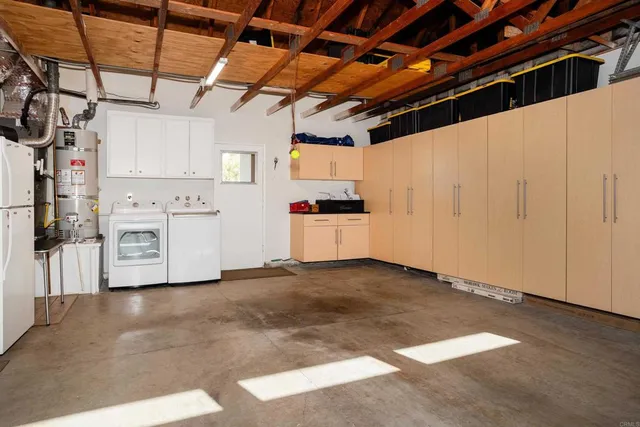 a view of a storage & utility room with stainless steel appliances