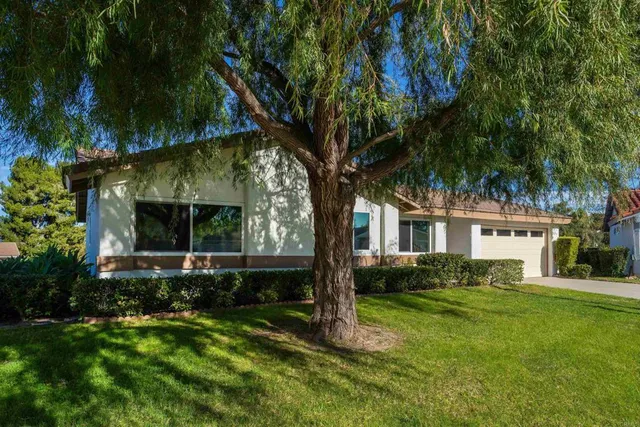 front view of house with a yard