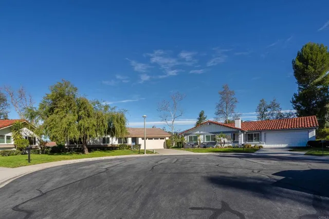 a view of a street with houses