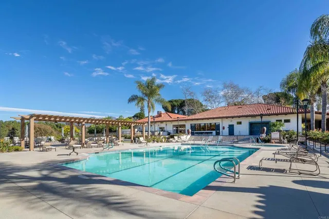 a view of the patio and a yard