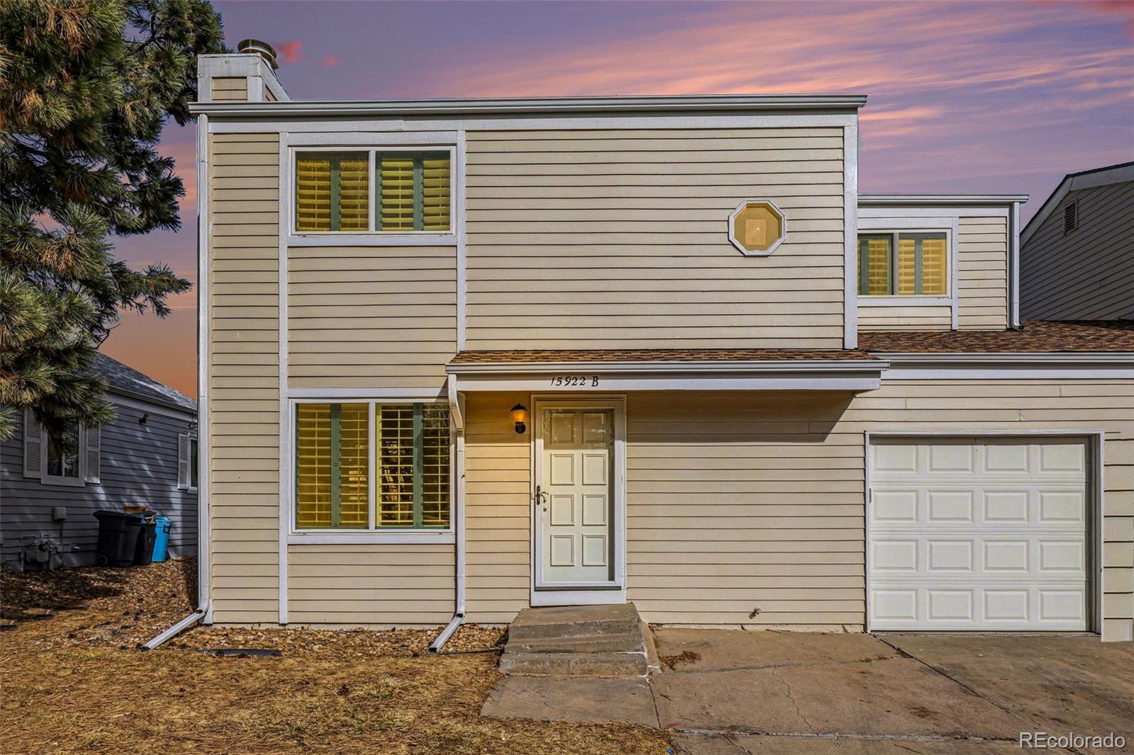 15922 East Rice Place, Unit B Aurora, CO 80015 - Photo 1 of 30 a view of a house with a window