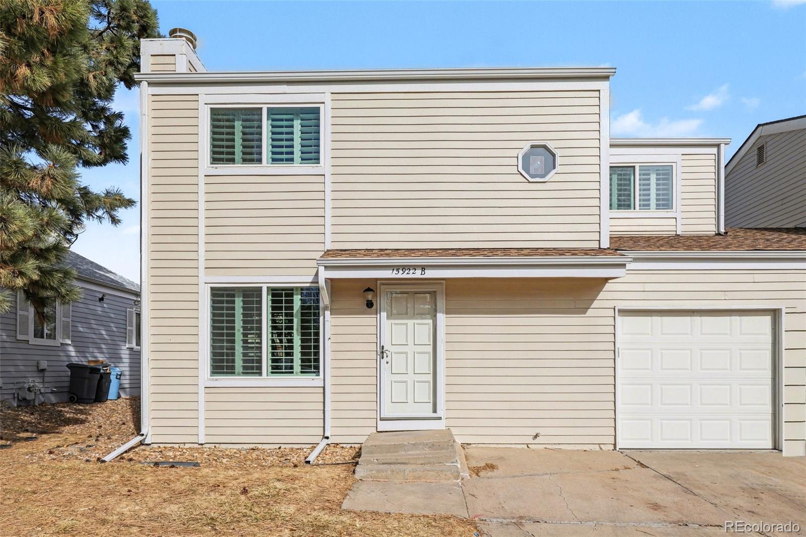 15922 East Rice Place, Unit B Aurora, CO 80015 - Photo 2 of 30 a view of a house with white door