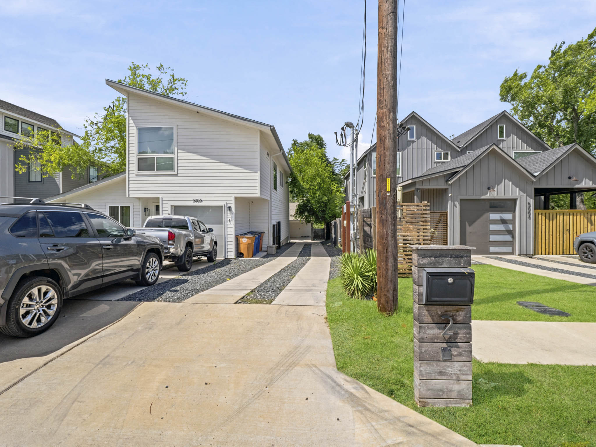 5005 Lott Avenue, Unit 2 Austin, TX 78721 - Photo 2 of 25 Modern architecture with clean lines and inviting outdoor spaces define this contemporary dwelling.