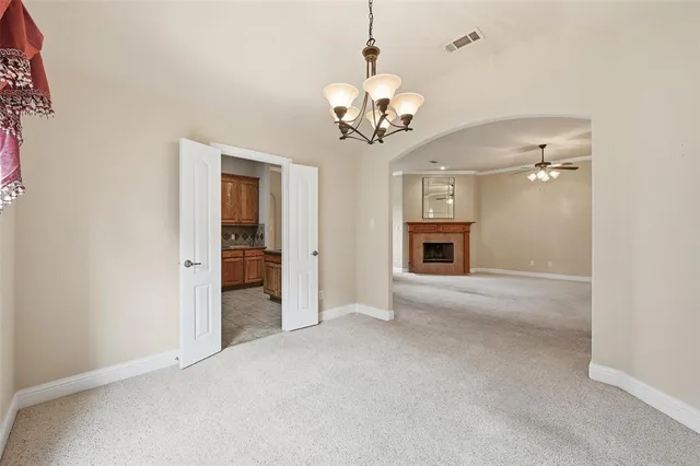 en view of an empty room with a bathroom