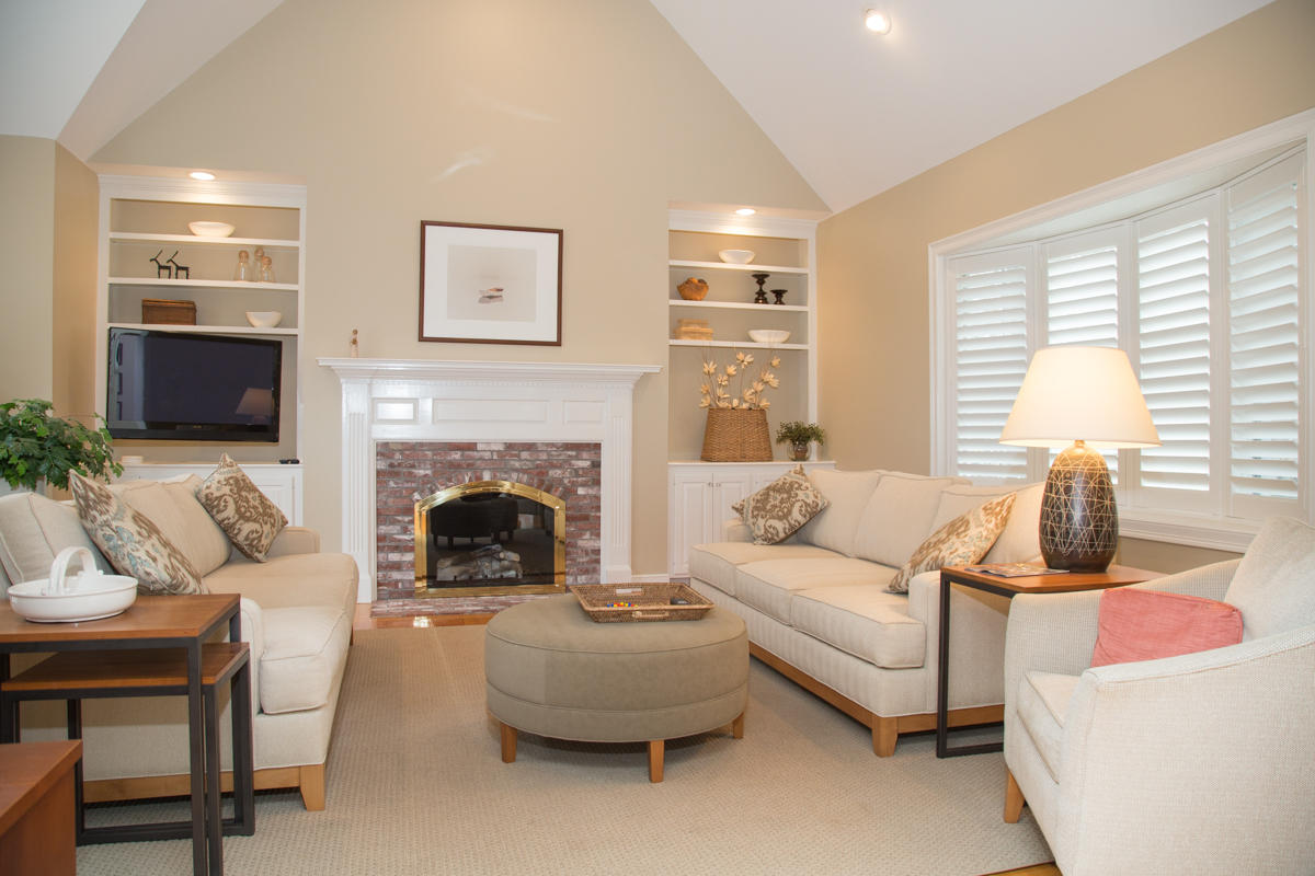 193 Midpine Road Cummaquid, MA 02675 - Photo 11 of 31 a living room with furniture and a fireplace