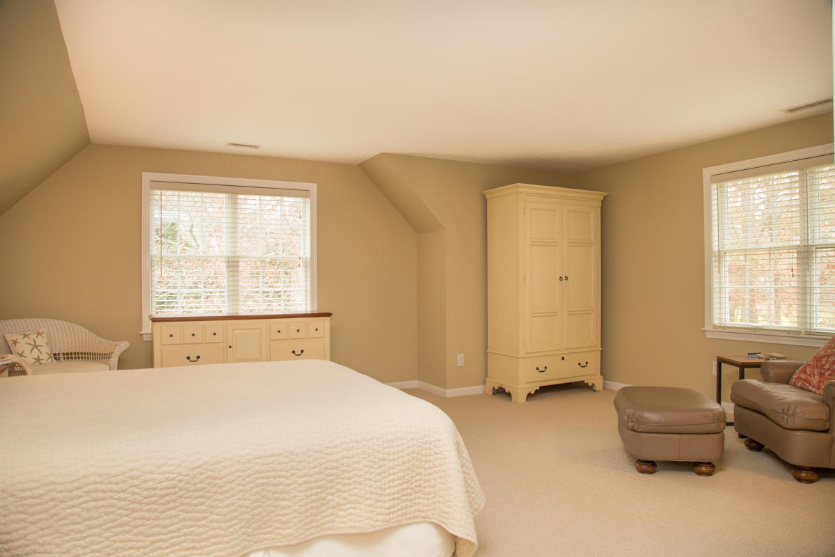 193 Midpine Road Cummaquid, MA 02675 - Photo 17 of 31 a bedroom with a bed and a window