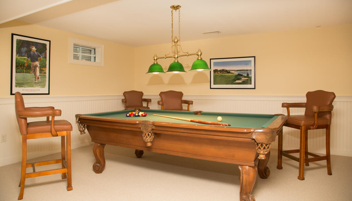 193 Midpine Road Cummaquid, MA 02675 - Photo 26 of 31 a room with a table and chairs