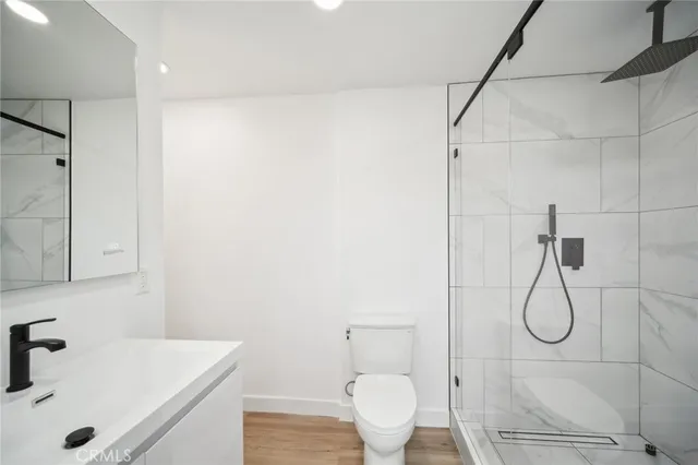 a bathroom with a sink and a large mirror