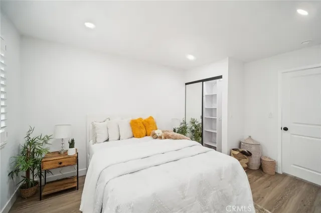 a bathroom with a sink a mirror and a shower