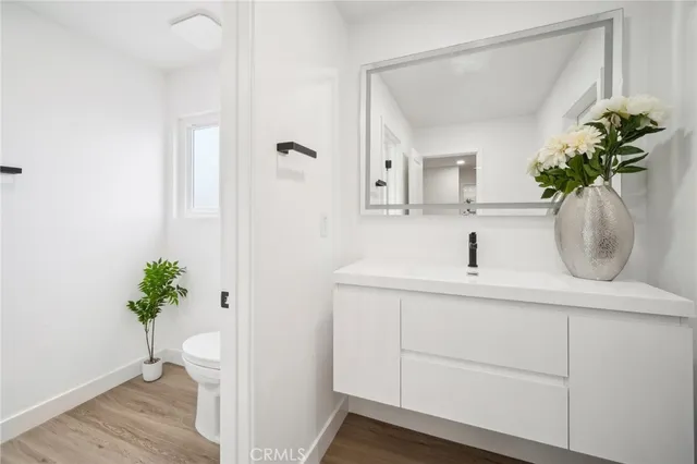 a bathroom with a glass door shower