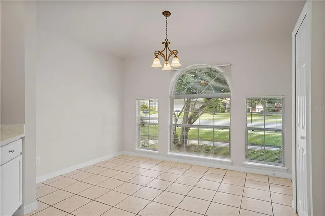 a view of a livingroom with wooden floor