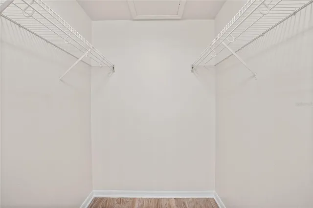 a bathroom with a double vanity sink and mirror