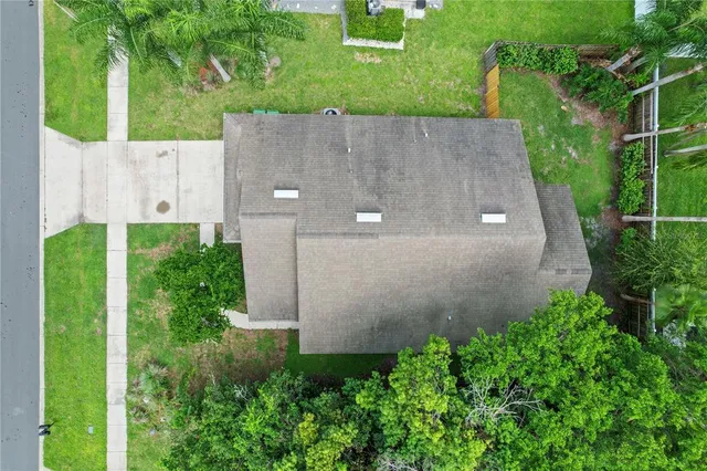 a house with garden in front of it