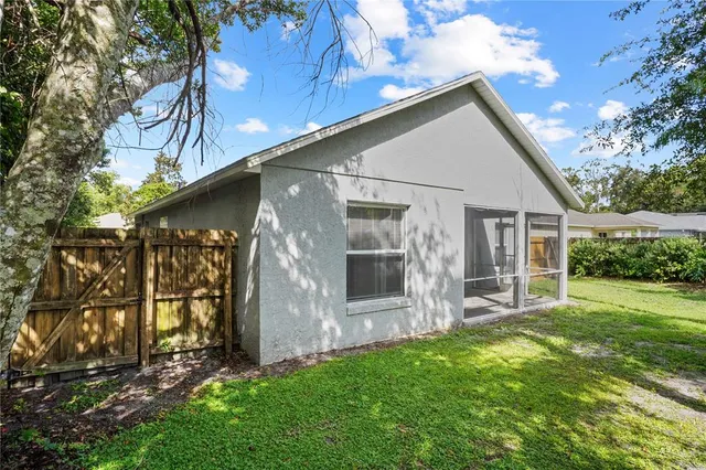 a view of backyard with green space