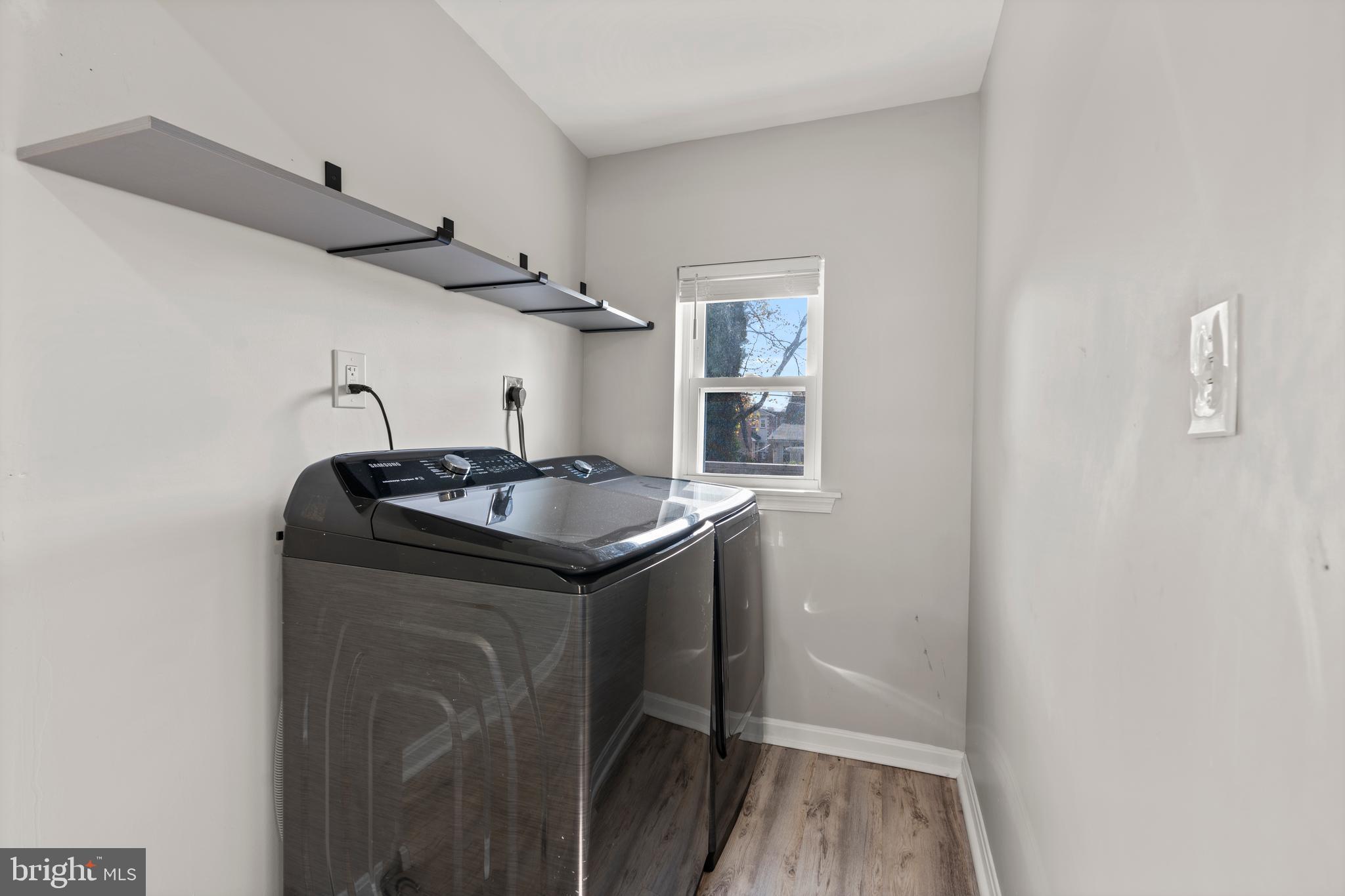 3809 West Cold Spring Lane Baltimore, MD 21215 - Photo 19 of 47 a kitchen with a sink and cabinets