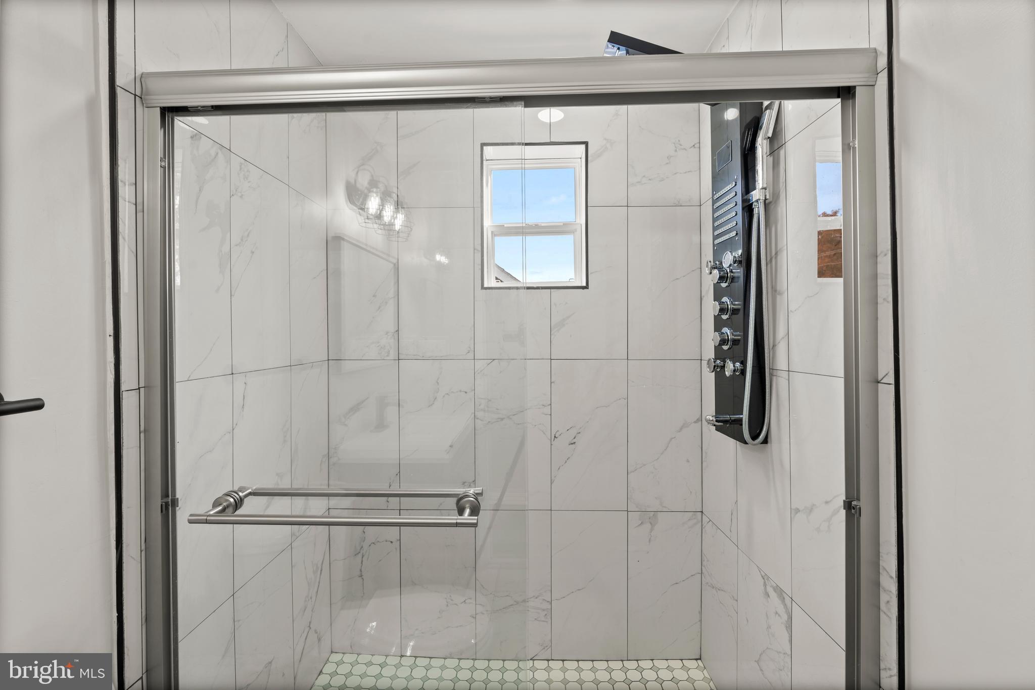 3809 West Cold Spring Lane Baltimore, MD 21215 - Photo 31 of 47 a bathroom with a shower