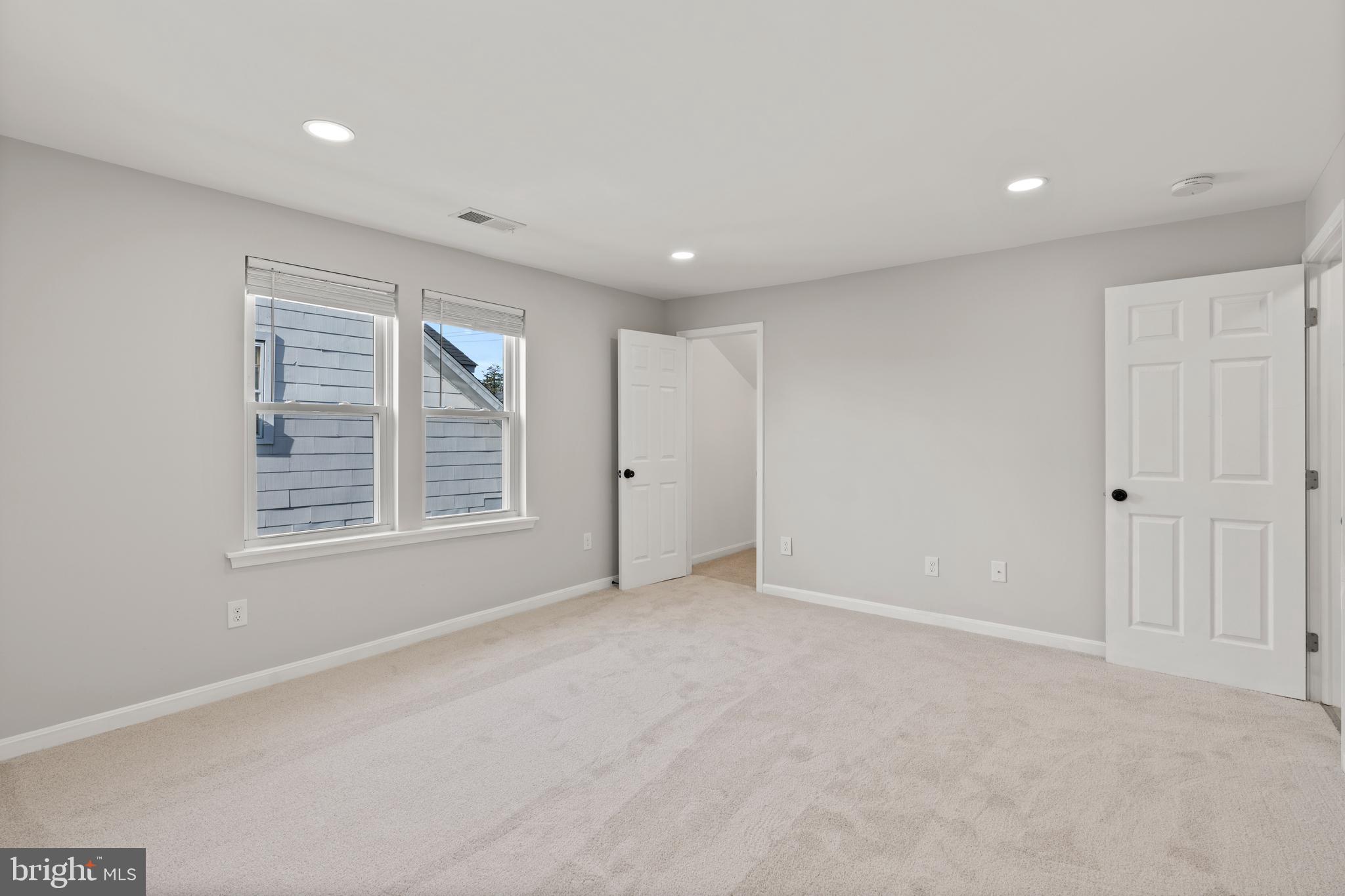 3809 West Cold Spring Lane Baltimore, MD 21215 - Photo 34 of 47 a view of an empty room with a window