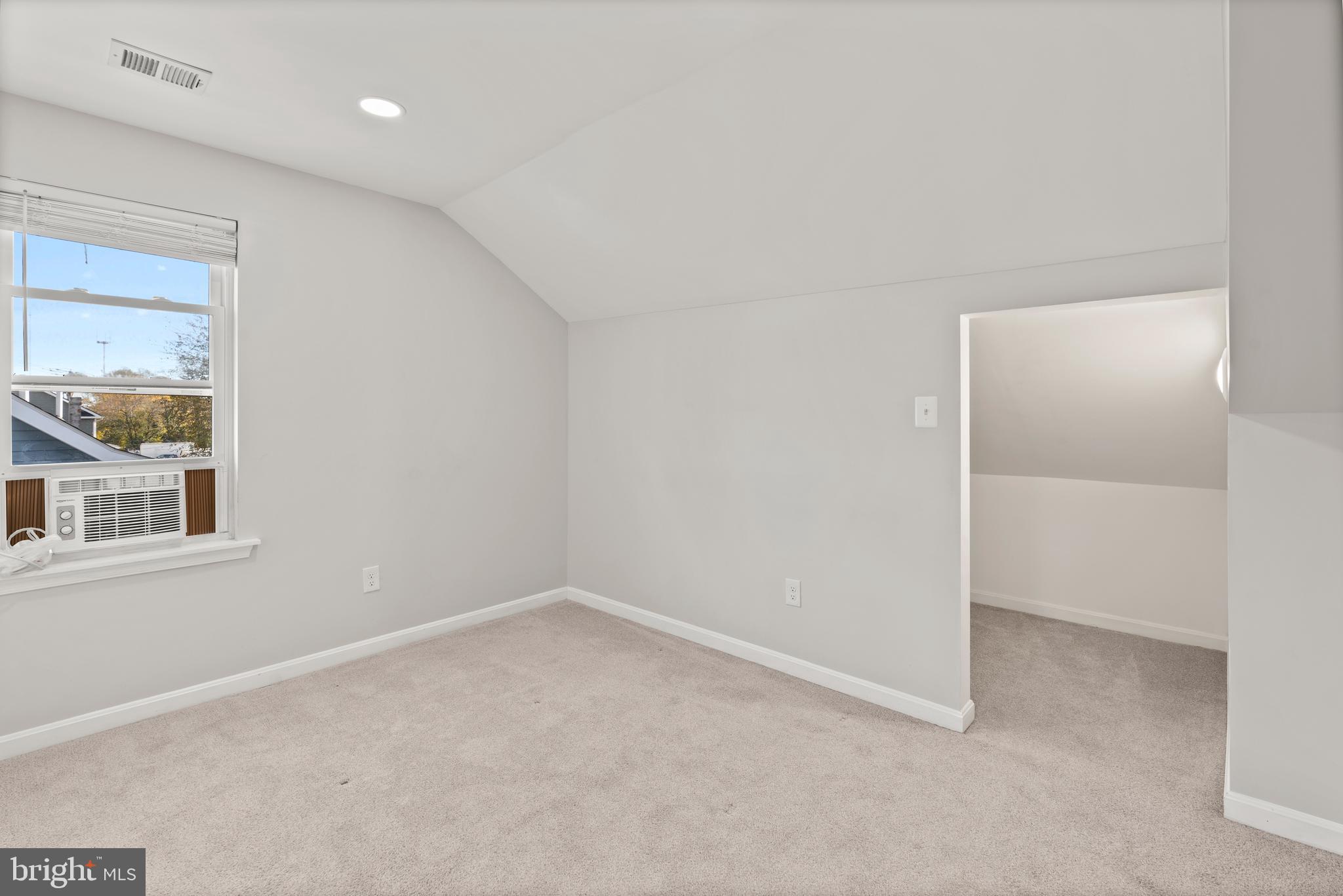 3809 West Cold Spring Lane Baltimore, MD 21215 - Photo 38 of 47 an empty room with a window