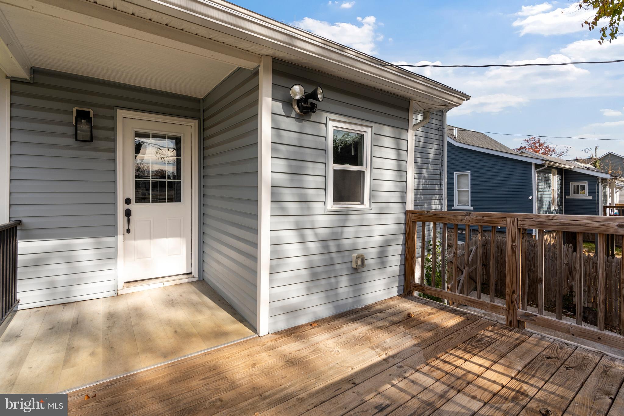 3809 West Cold Spring Lane Baltimore, MD 21215 - Photo 43 of 47 a view of a house with a door and wooden floor