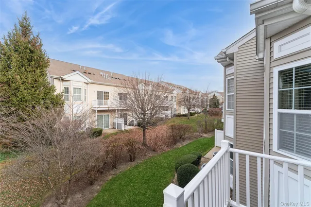 a view of a car parked front of a building