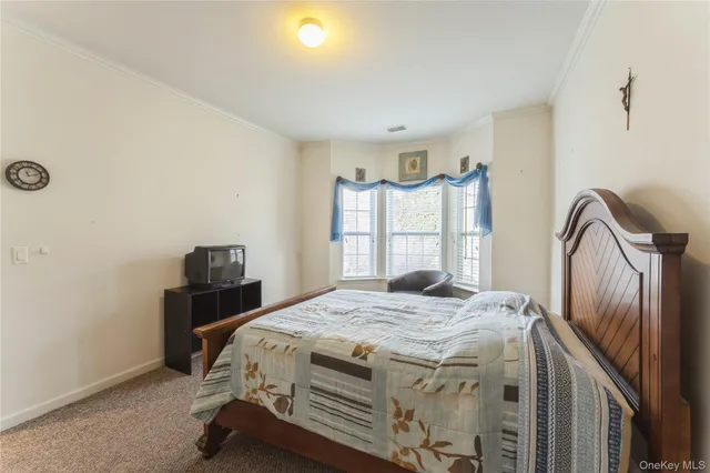 a bathroom with a toilet a sink and shower